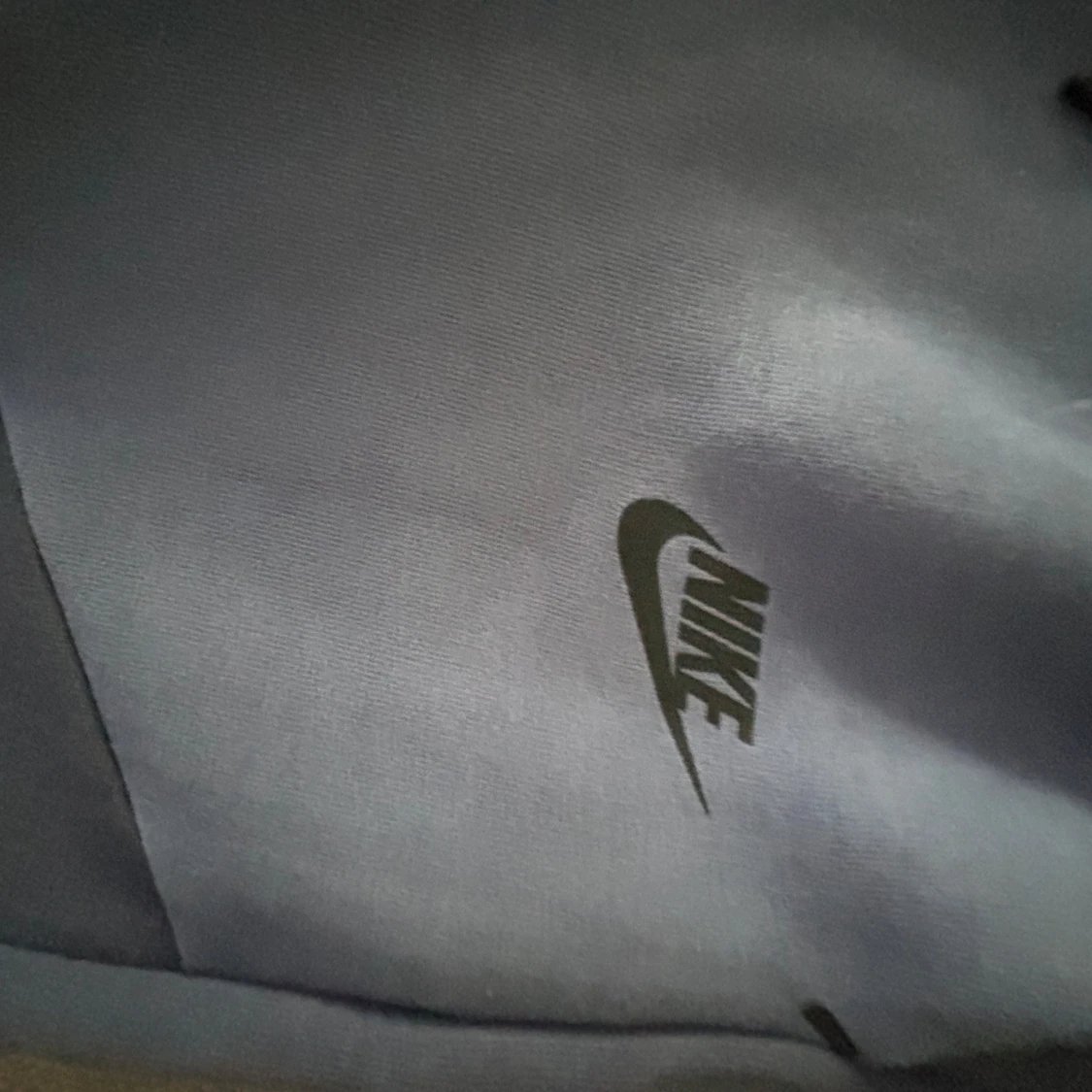 Blå mjukisbyxor från Nike med snörning - 1