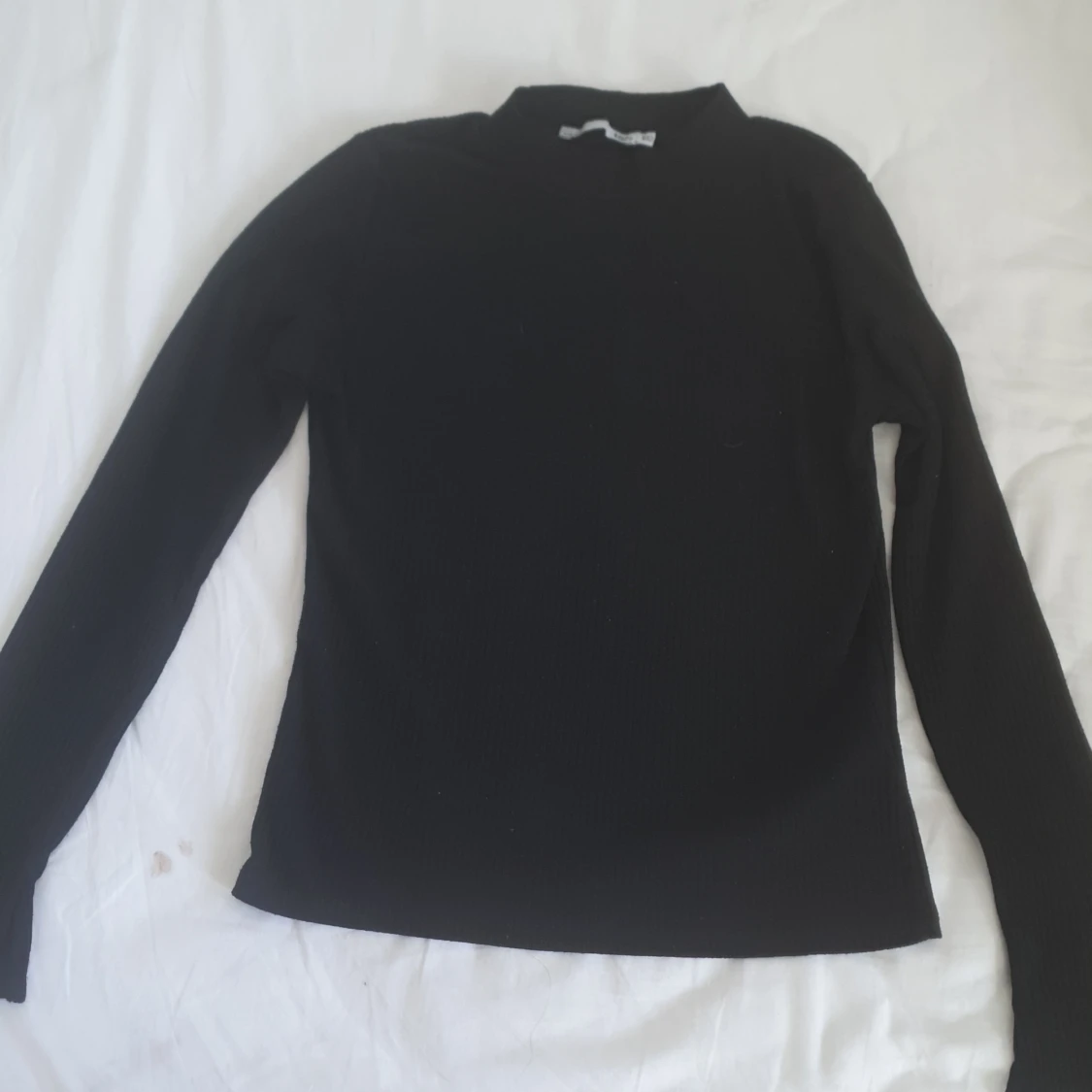 Svart ribbad tröja från 157