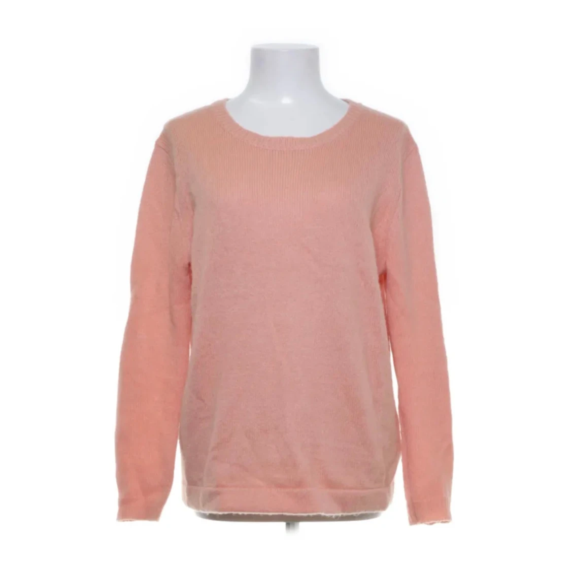 Ljusrosa stickad tröja