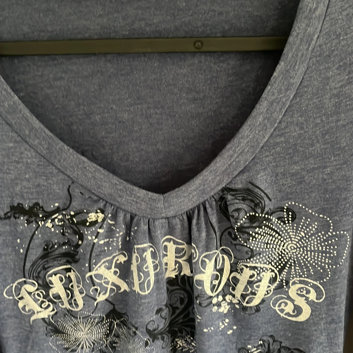 Blå långärmad topp med tryck - 1