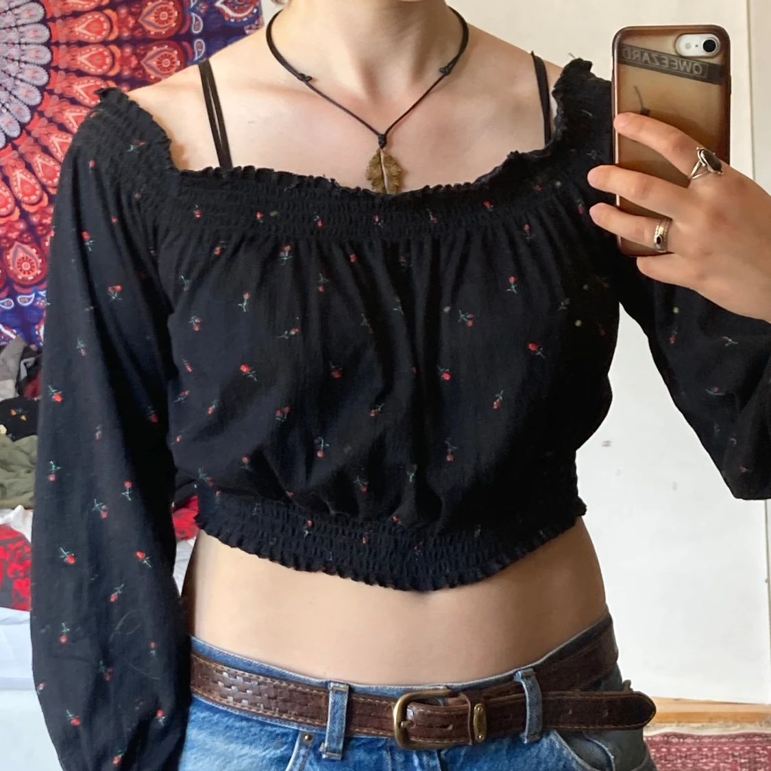 Svart blommig offshoulder blus från H&M, M