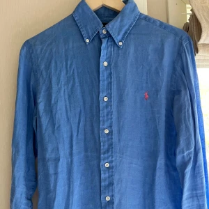 Polo Ralph Lauren skjorta  - Snygg blå polo skjorta i mycket bra skick 