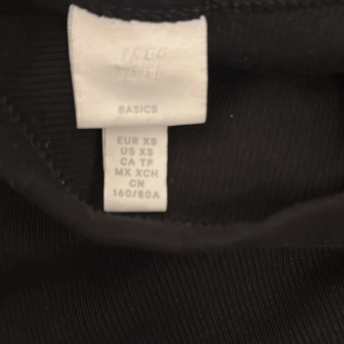 Svart ribbad linnetopp från H&M XS - 2