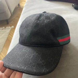 Svart GG Keps - Svart GG Keps bra skick 