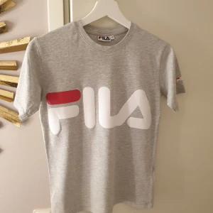 Tshirt  - knappt använd 