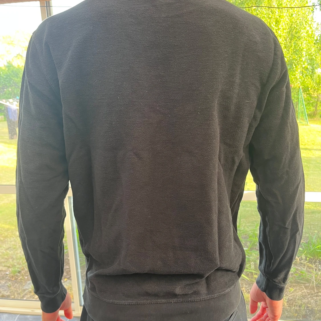 Svart sweatshirt från Lee med logga - 1