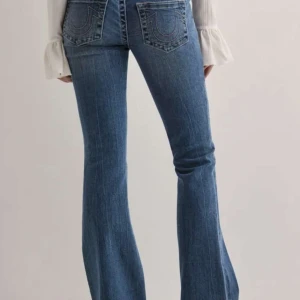 Low waist bootcut True Religion jeans  - True religion jeans från Nelly, använd fåtal gånger. 