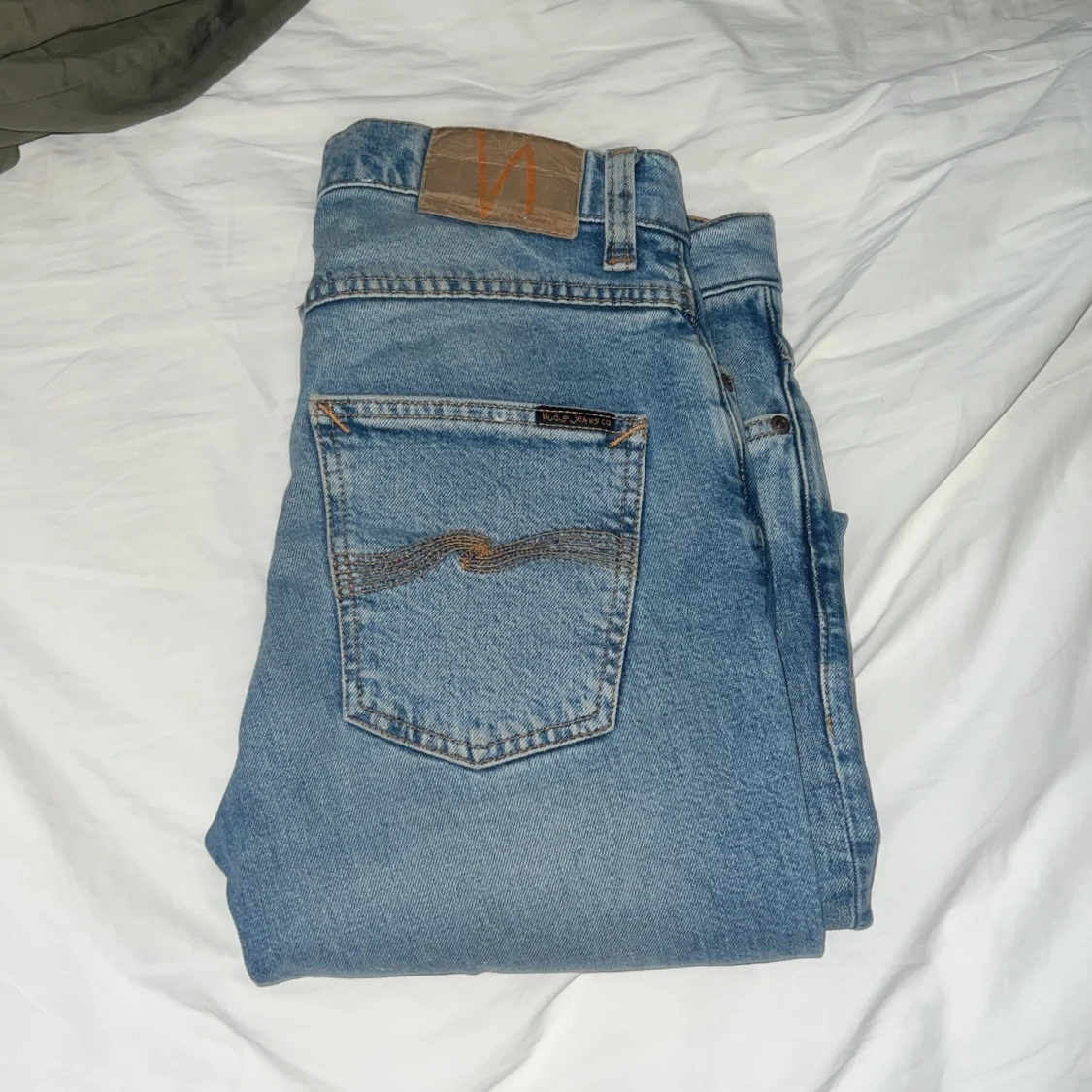 Ljusblå jeans från Nudie Jeans, 28/30