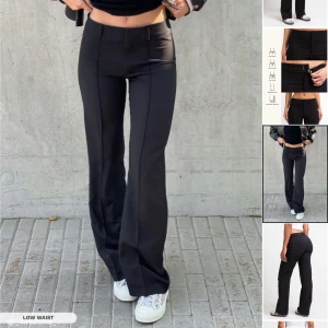 Madlady lågmidjade kostymbyxor - Snygga svarta lågmidjade kostymbyxor från Madlady. Jag är 171cm lång!