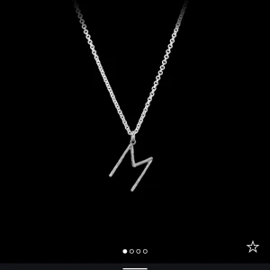 Nilsdotter halsband bokstav L - Nilsdotter halsband i bokstaven L och längd 45