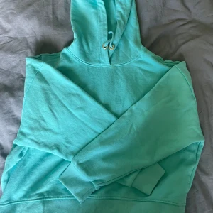 Turkos hoodie  - Blågrön