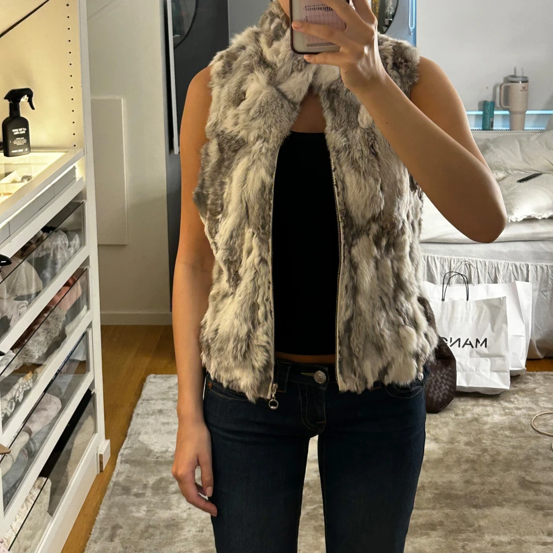 Grå pälsväst från Hollies