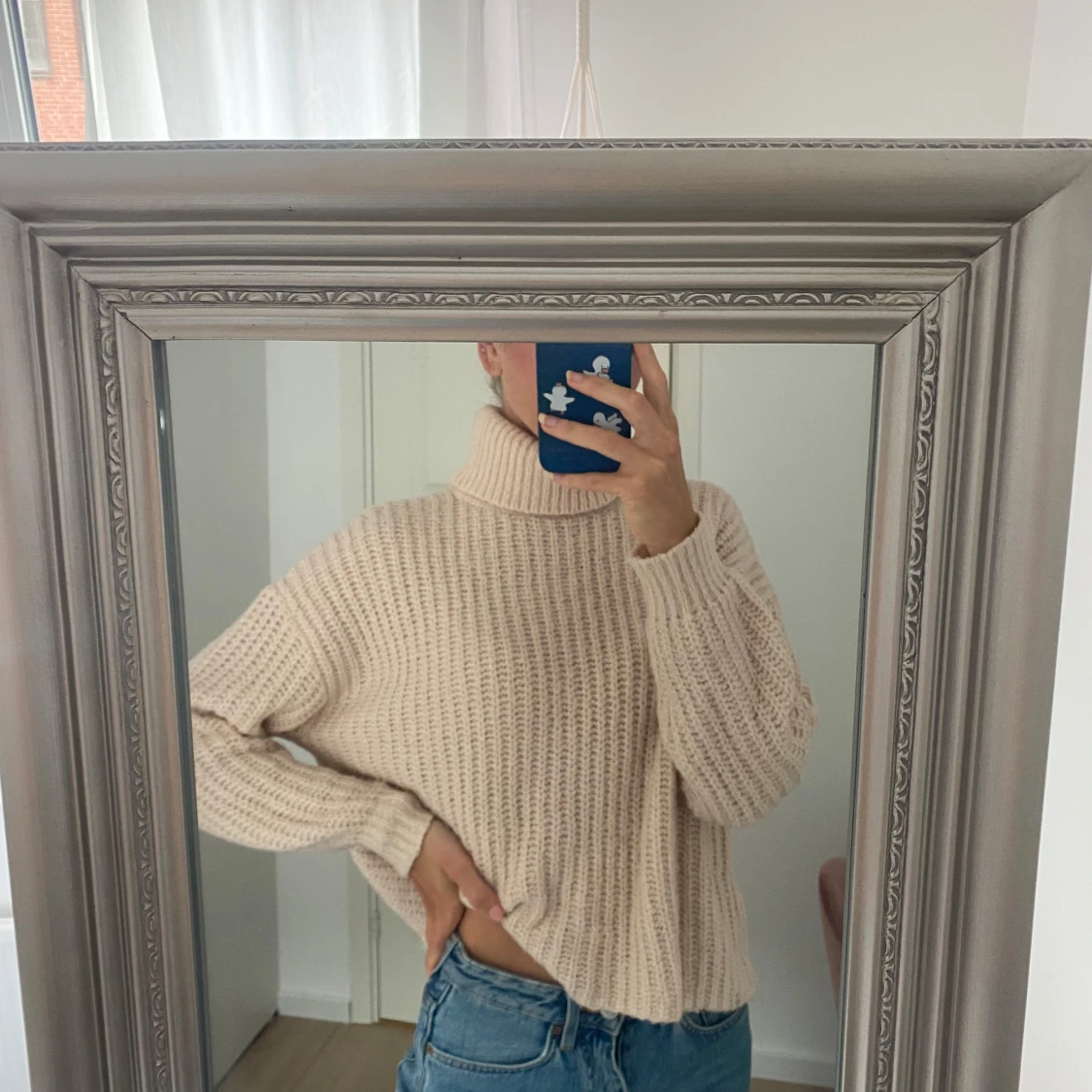 Beige stickad polotröja