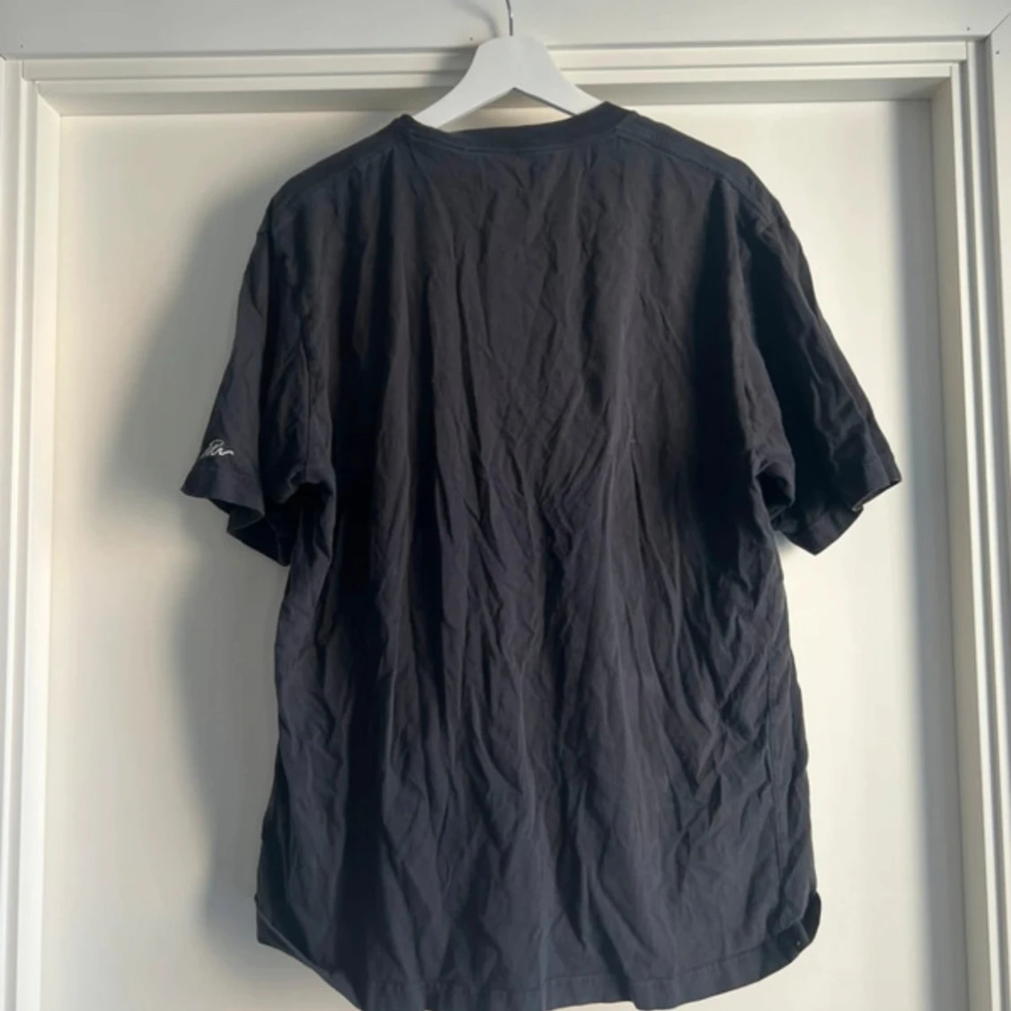 Svart t-shirt från UT x Tim - 1