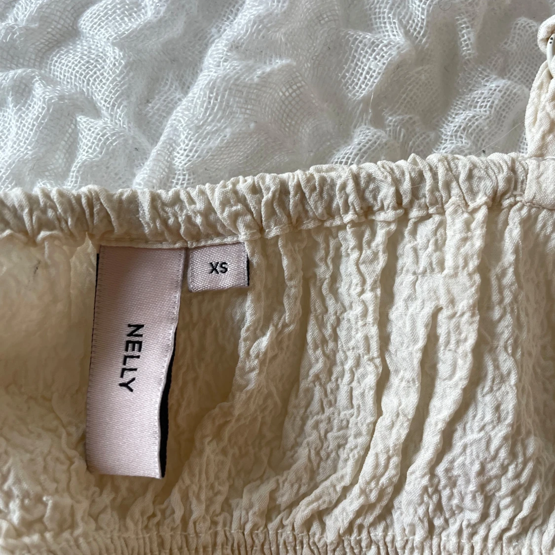 Krämvit linnetopp från Nelly XS - 2