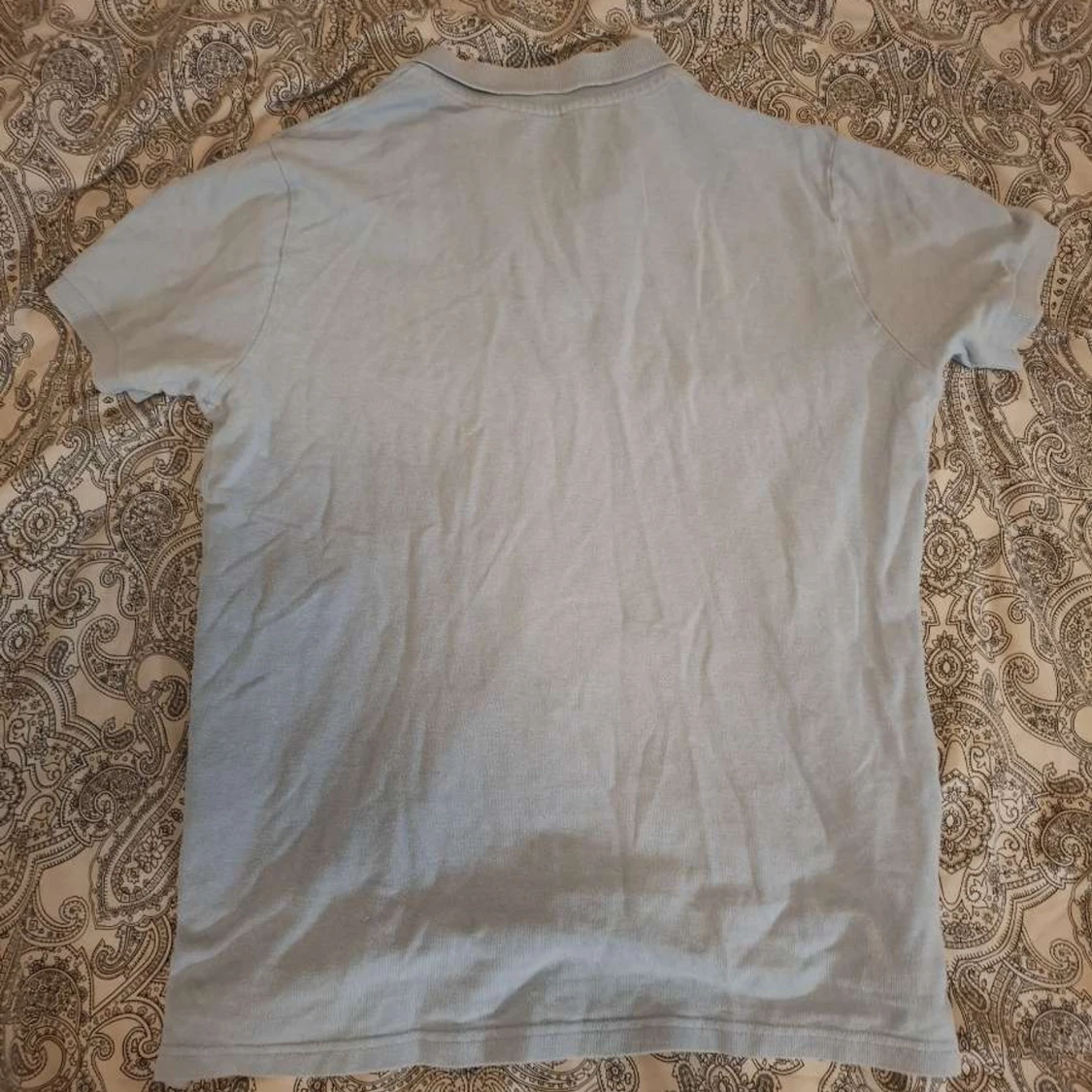 Ljusblå pikétröja med krage - 1