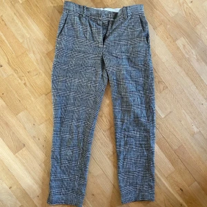 Rutiga grå kostymbyxor - Mid waist