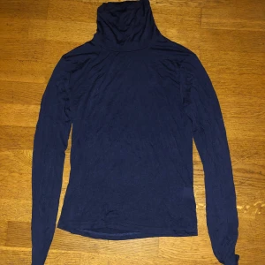 Mörkblå polotröja - Stolek M