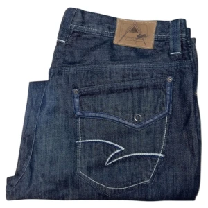 Atiziano Baggy jeans - Ataziano Baggy jeans W42 [Ytterbenslängd 123cm] [Innerbenslängd 90cm] [Midja 55cm] [Benöppning 28cm]