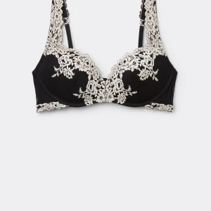 Intimissimi superpushup Gioia pretty flowers  - Populära intimissimi bh med vackra vita spetsbroderier i svart. Sparsamt använd och tvättad, lappen är bortklippt. Storlek 70B 