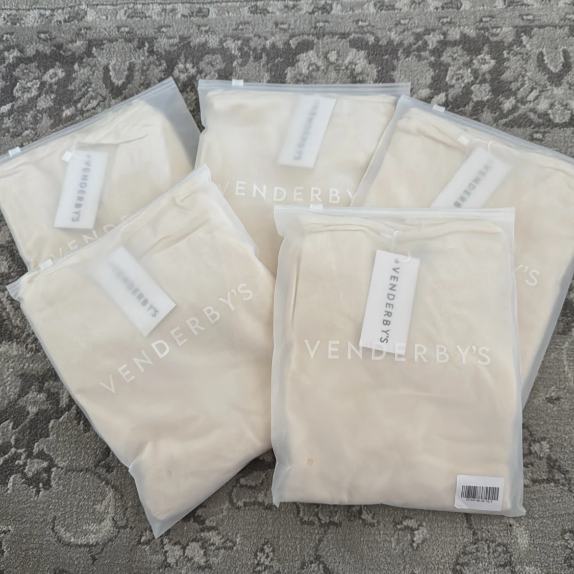 Omlott kofta i ljus beige från Venderby's