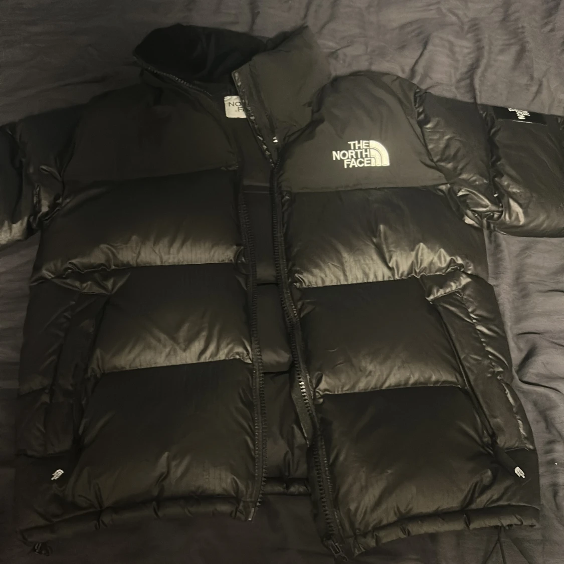 Svart pufferjacka från The North Face