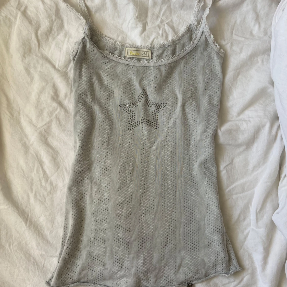 Grått spettslinne med stjärna 