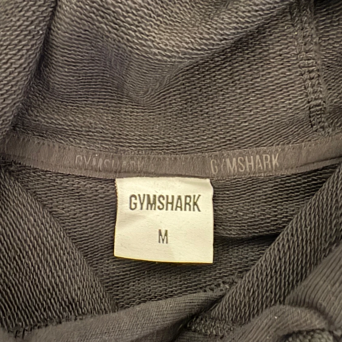 Svart hoodie från Gymshark M - 3