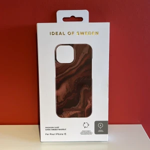 iDeal of Sweden / DARK AMBER MARBLE / MagSafe  - Ouppackat och oanvänt magnetisk mobilskal med MagSafe. För IPhone 15