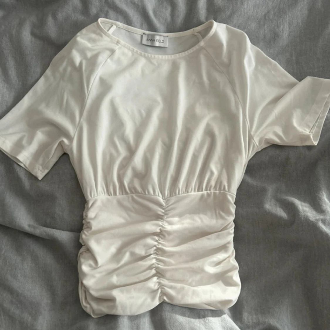 Anna Field topp
