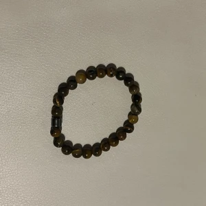 Pärlarmband allcap1 - Köpt från allcap1