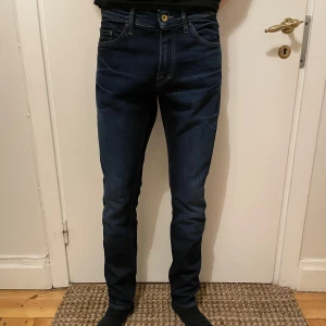 Tiger of Sweden Jeans - Säljer ett par snygga och Tiger of Sweden Jeans i modellen Pistolero. De är i storlek W30 L32. Jeansen är i väldigt bra skick och sitter riktigt bra. Jag säljer nu dessa för endast 399 kr. Hör av er vid frågor eller bud.