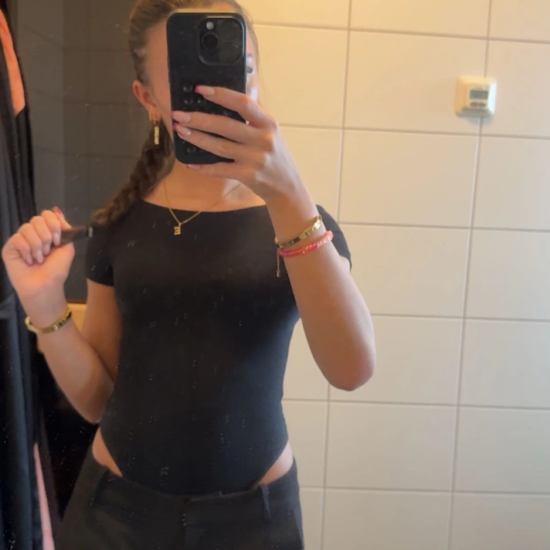 Svart kortärmad body