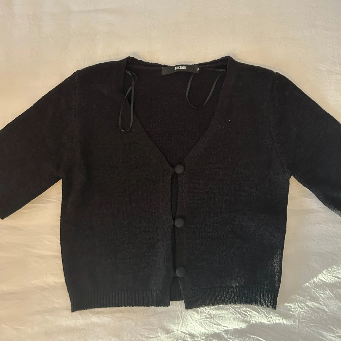 Svart stickad kofta från Bik Bok