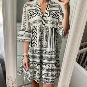 Mönstrad klänning S-M - Mönstrad midi klänning S-M