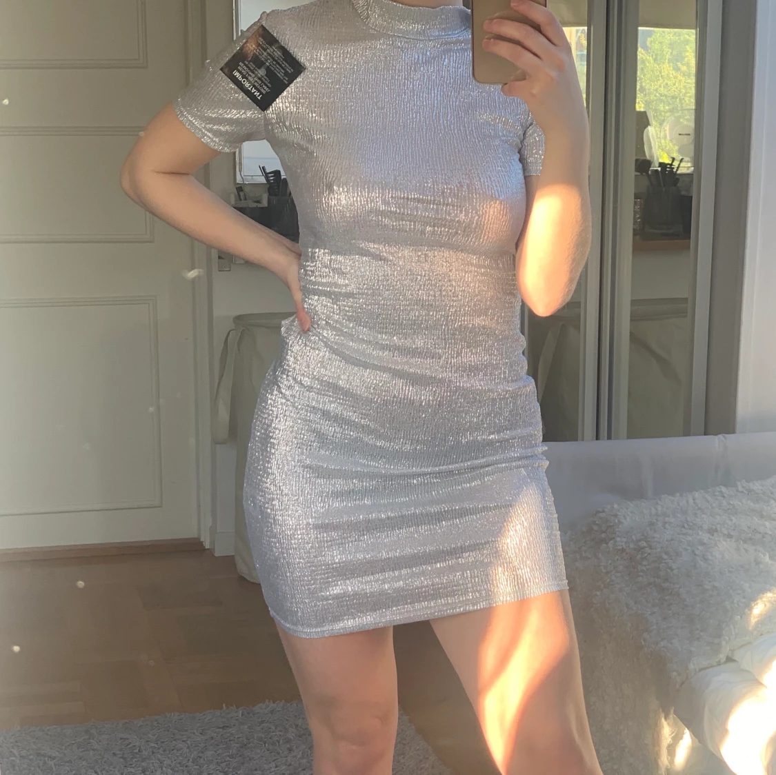 Silverklänning från Nelly