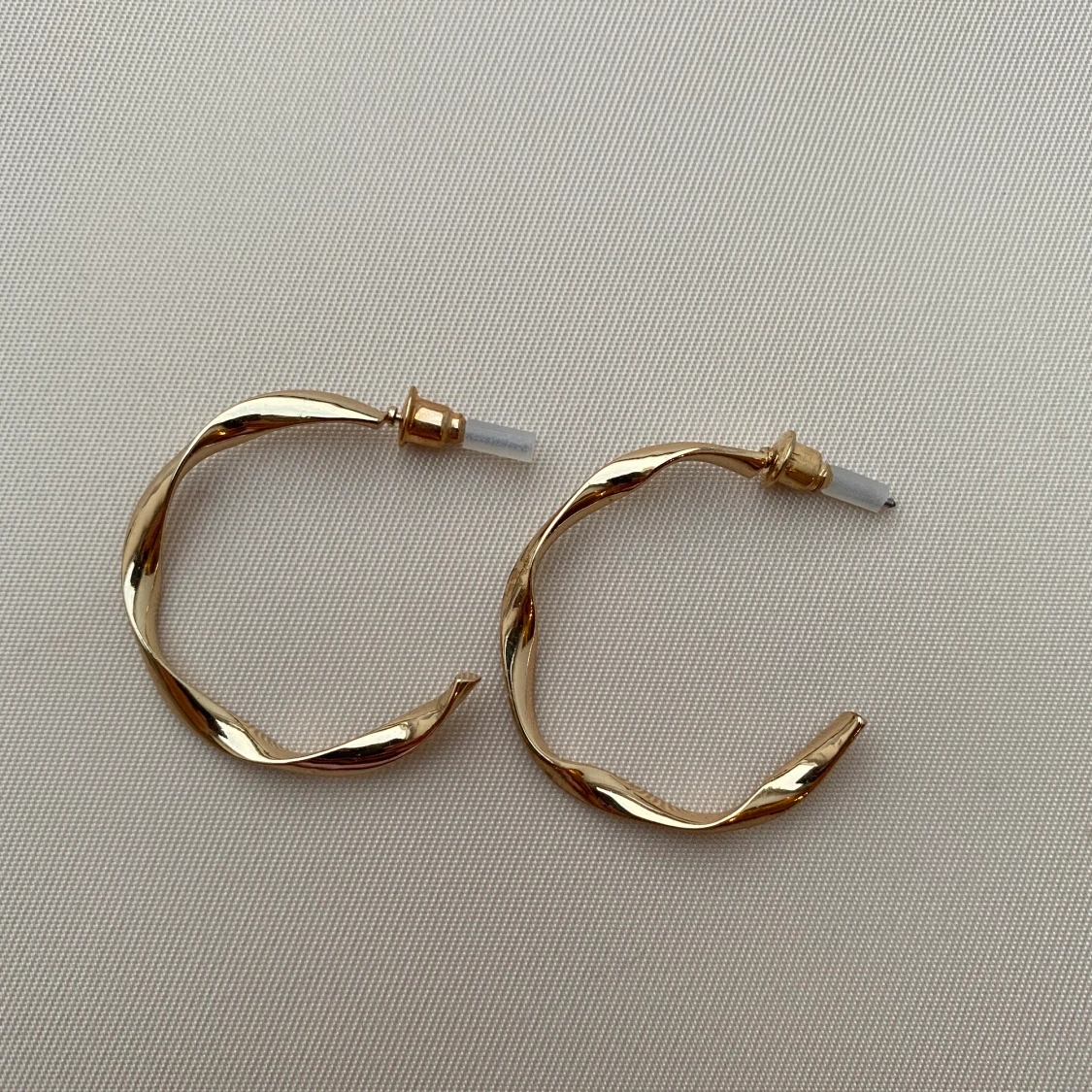 Oanvända örhängen - 90