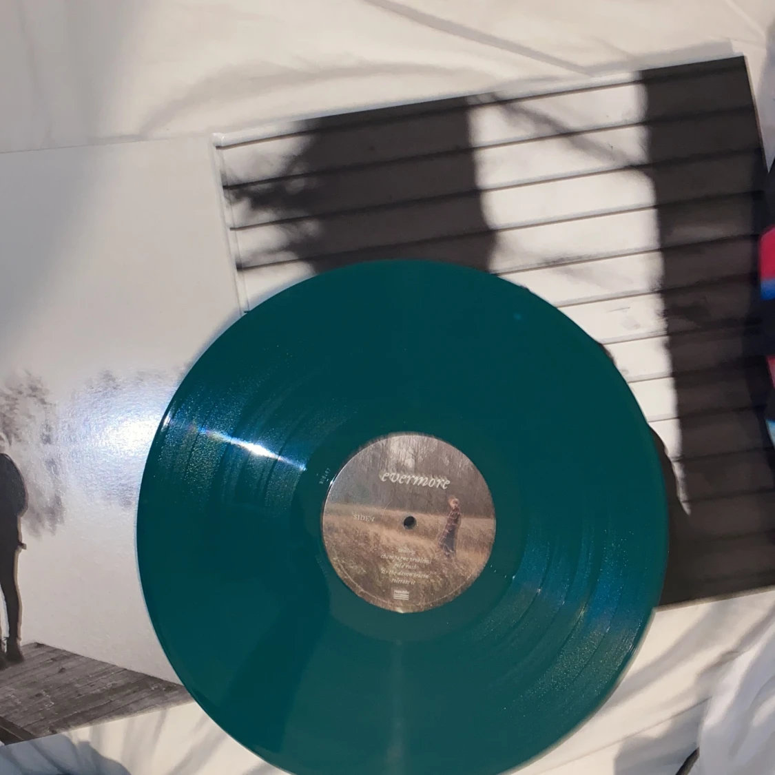 Taylor swift evermore skiva, oöppnad grön limited edition - 91