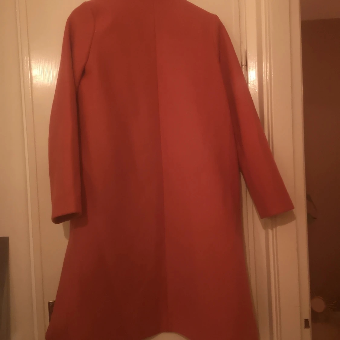 Intressekoll: Knallrosa kappa från Hm. XS - 90