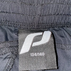 Svarta vindtäta byxor  - Svarta vindtäta byxor 