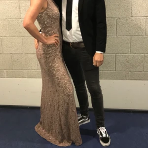 Long dress with sequins gold/purple - Beutiful long dress, perfect for graduation or a wedding!