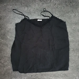 Linne - Svart topp i strlk 42