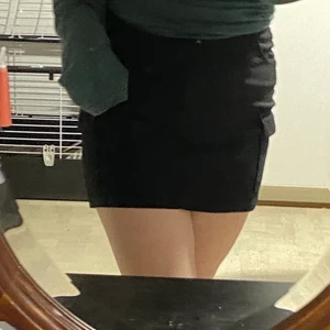 Cargo kjol - Tight kort kjol med fickor, ca storlek L men saknar tagg 