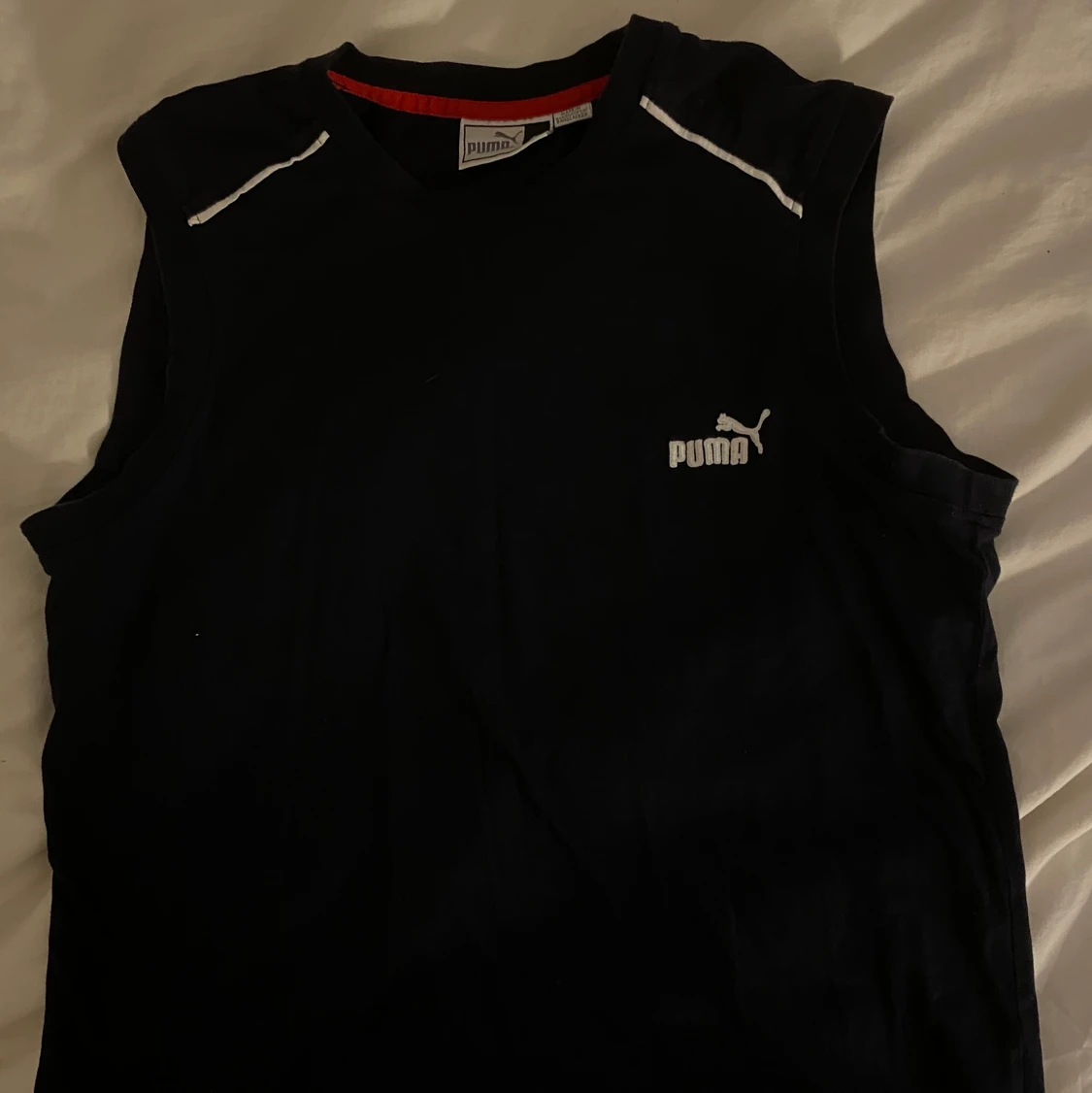 Mörkblå puma väst