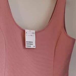 Rosa klänning storlek 10  - Storlek 10 är nog L eller XL 