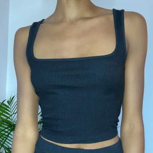 Black crop top from nakd. It’s an extra small but it runs a bit bigger like a small/medium. Really cute and basic but it fits with many outfits. 