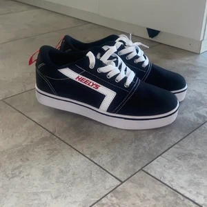 heelys rullskor - helt nya oanvända rullskor från heelys !!