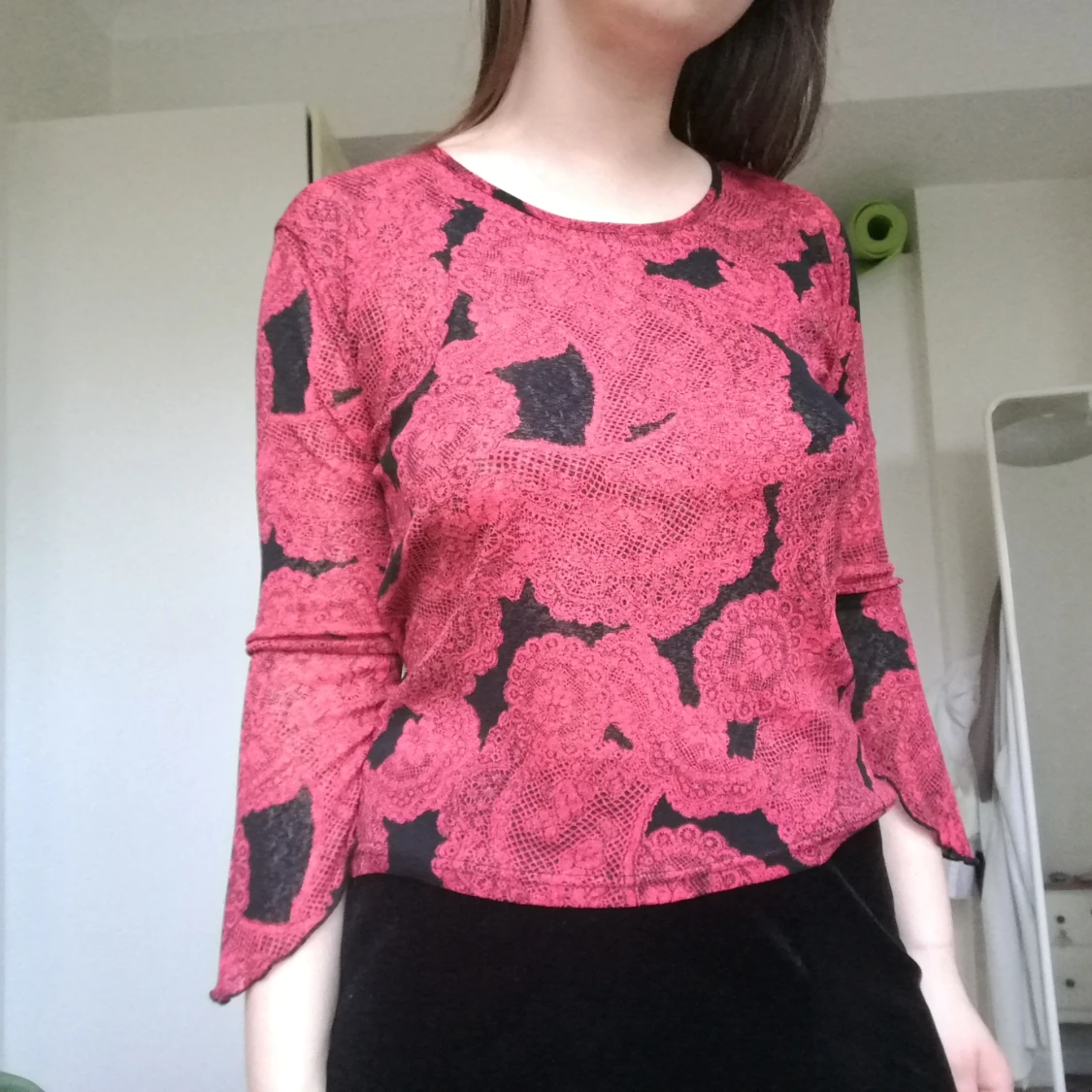 Svartröd topp från Humana