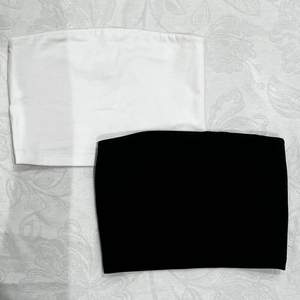 Två stycken bandeau toppar från Gina Tricot i svart och vitt. Knappt använda så i mycket fint skick. Båda är i storlek XS. Köp 1 för 40 eller båda för 70. Hör av dig vid intresse!