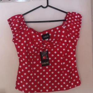 Prickig topp - Nyskick. 